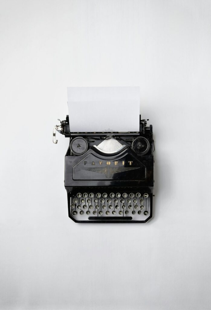 Vintage typewriter and paper for Small Press Alert: Carbon Copy Editions